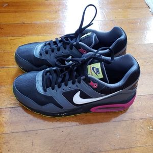 Big boys size 6 black and Purple Nike Air max